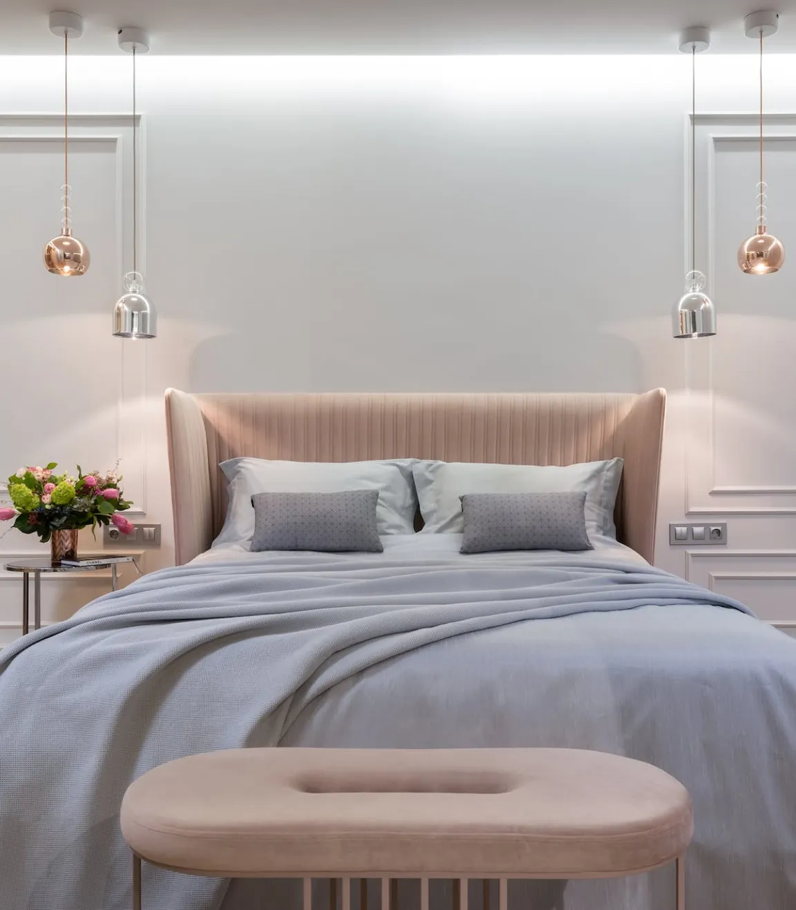 Photo of a double bed in Rose Hotel bedroom